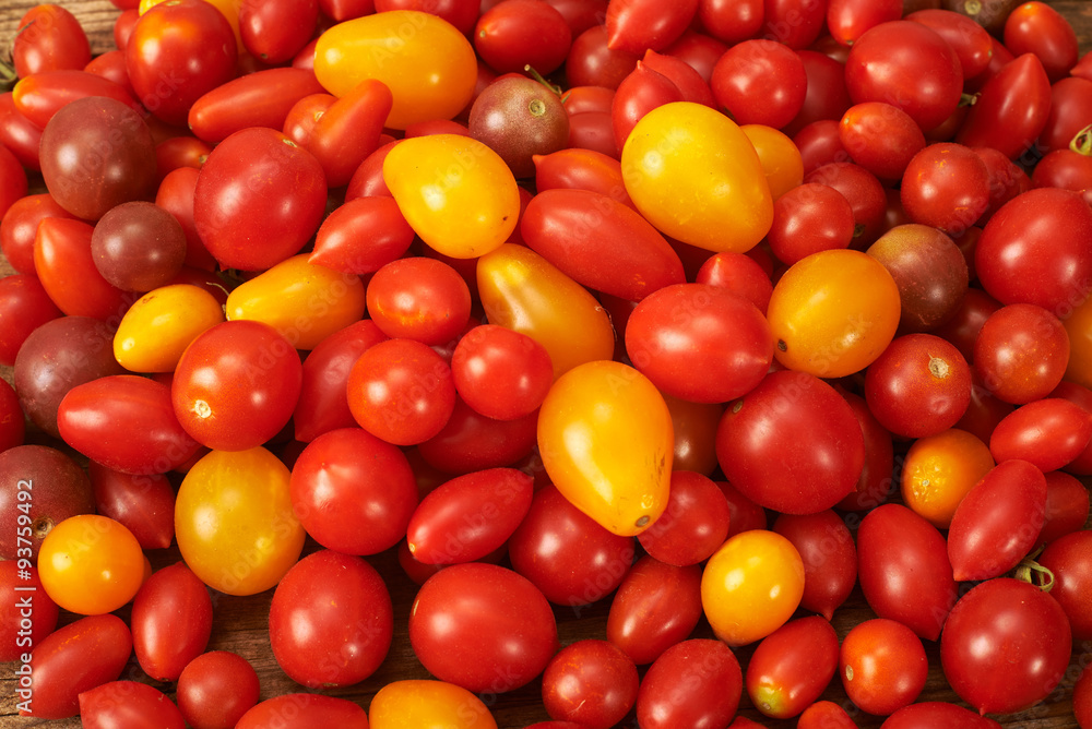 fresh tomato on wooden kitchen table fresh tomato on wooden kitchen table
