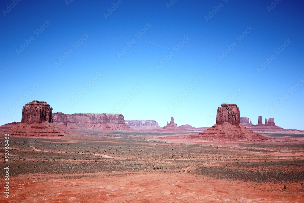 View from the Artist Point Overlook to West Mitten Butte, East Mitten Butte and Merrick Butte in Monument Valley, Utah USA View from the Artist Point Overlook to West Mitten Butte, East Mitten Butte and Merrick Butte in Monument Valley, Utah USA
