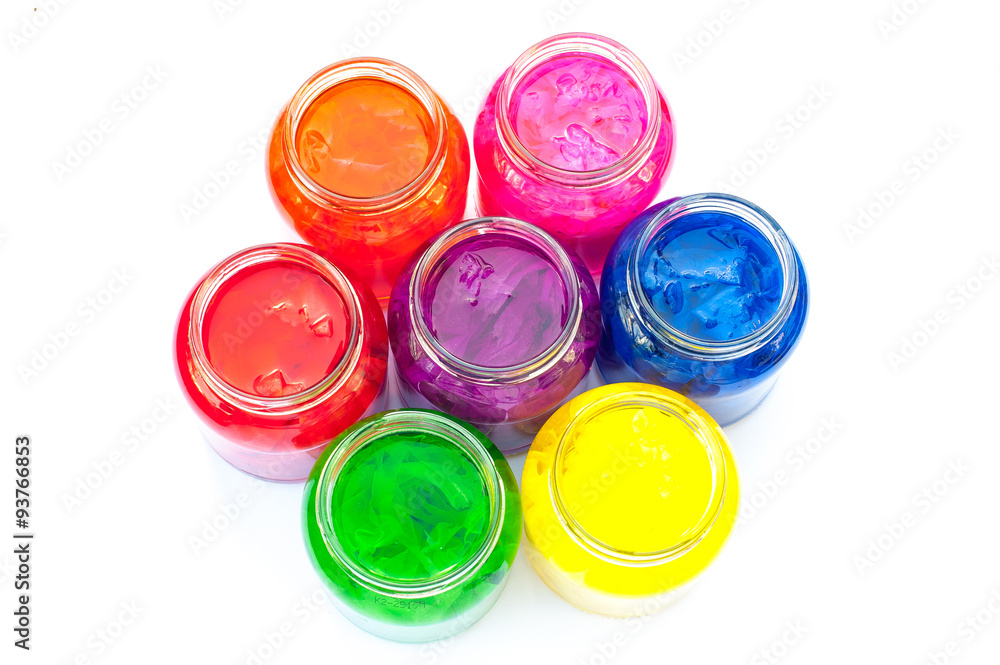 Jars full of colour/ Jars of coloured tissue paper in water, arranged in a circle Jars full of colour/ Jars of coloured tissue paper in water, arranged in a circle