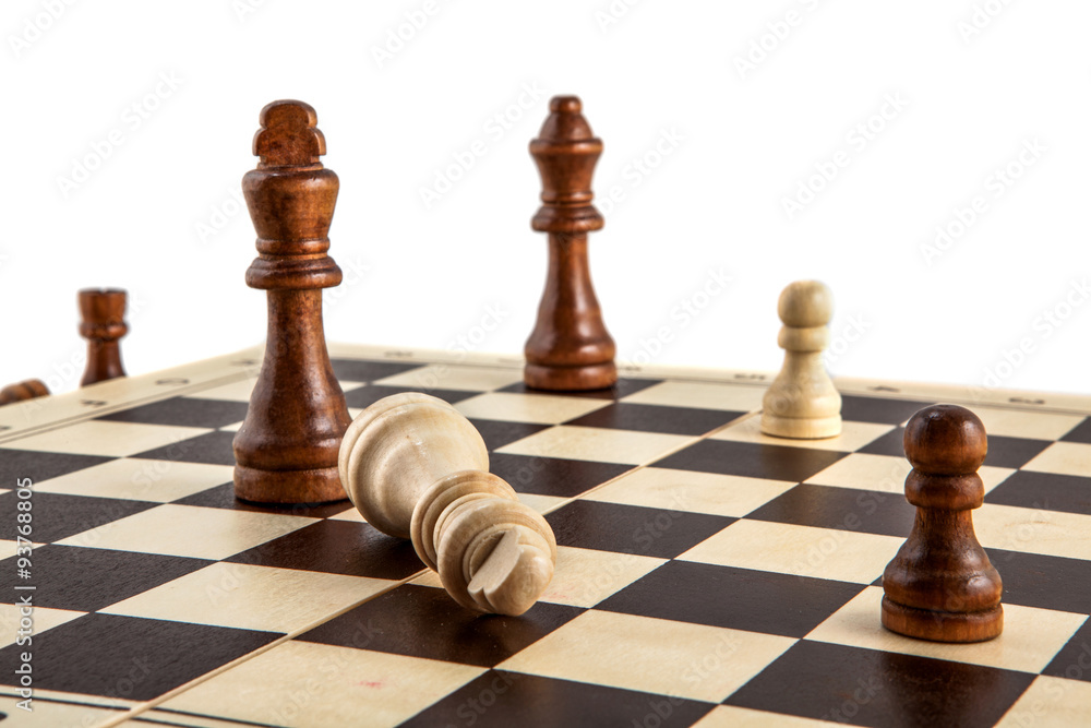 Chess board with chess wooden pieces isolated on white Chess board with chess wooden pieces isolated on white