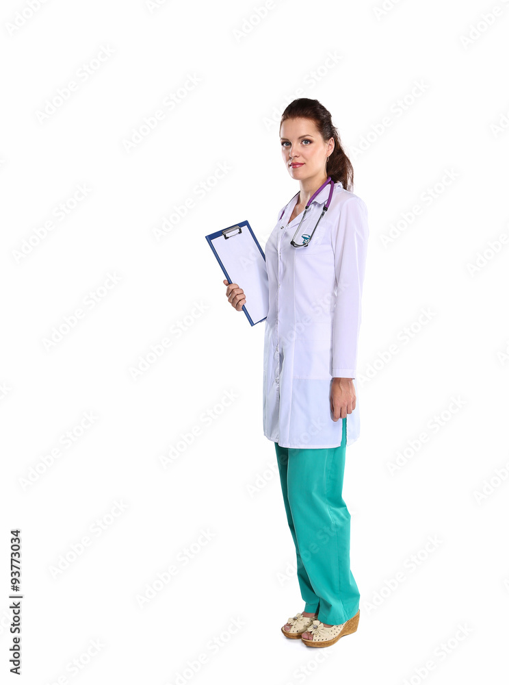 Portrait of young woman doctor with white coat standing in Portrait of young woman doctor with white coat standing in