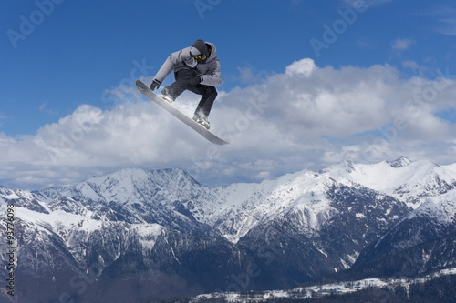 Snowboarder jumps in Snow Park © Vasily Merkushev