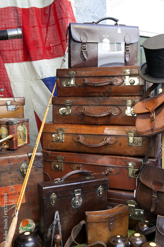 Suitcases near vintage shop at Portobello Market, in Notting Hill district, largest antiques market in UK, famous tourist attractions,  photo