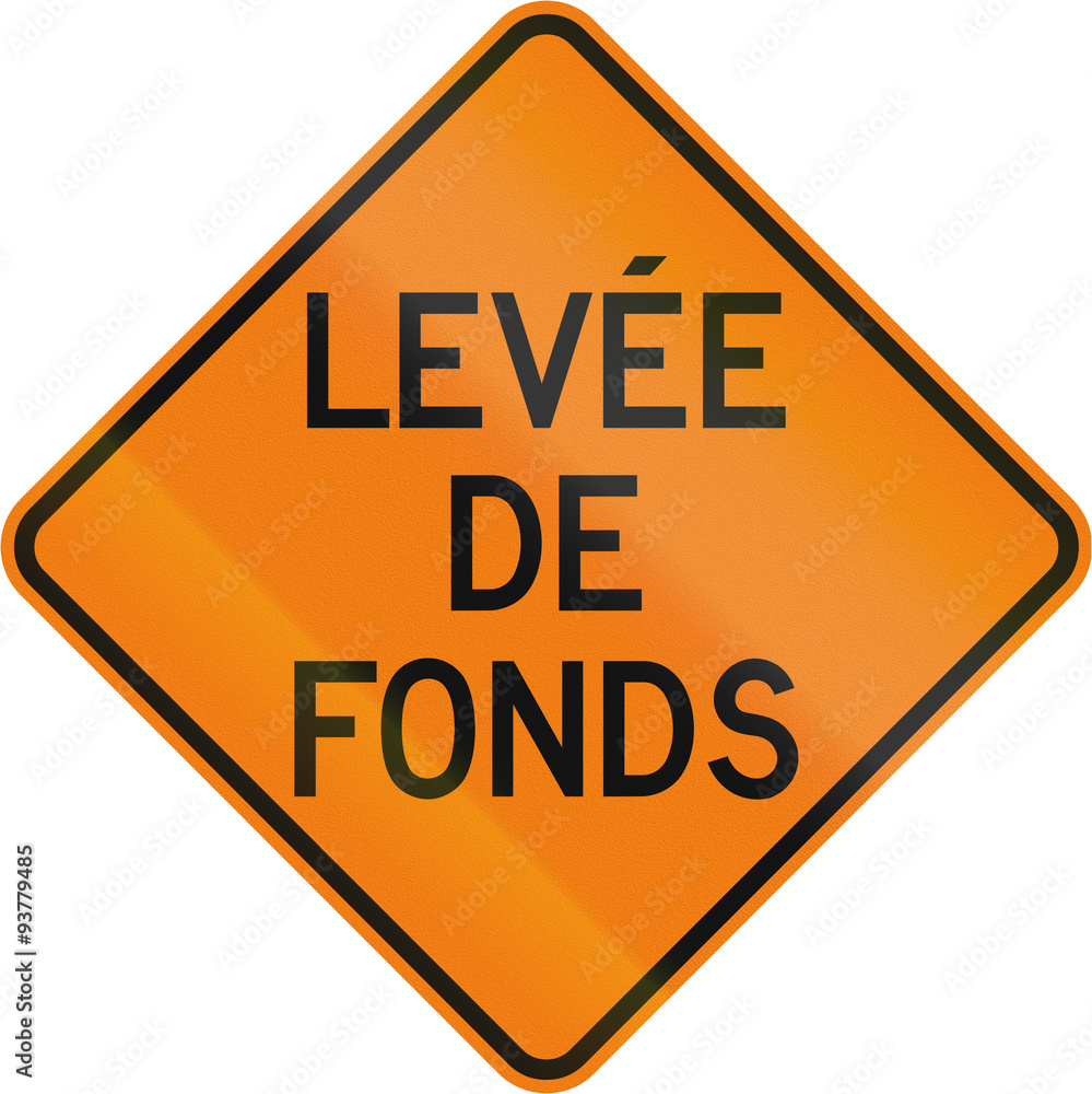 Temporary/Works road sign in Quebec, Canada - Raising of ground Temporary/Works road sign in Quebec, Canada - Raising of ground