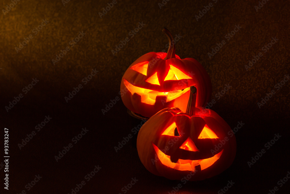 Creepy Halloween Pumpkin with candle light in black background Creepy Halloween Pumpkin with candle light in black background