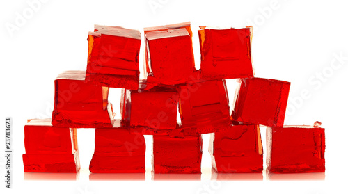 Slika na platnu Cubes of red jelly on a white background