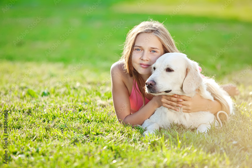 Happy kid with labrador in a nature Happy kid with labrador in a nature
