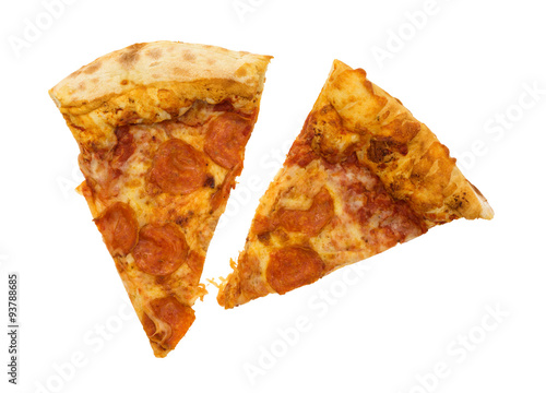 Two slices of pepperoni pizza on a white background