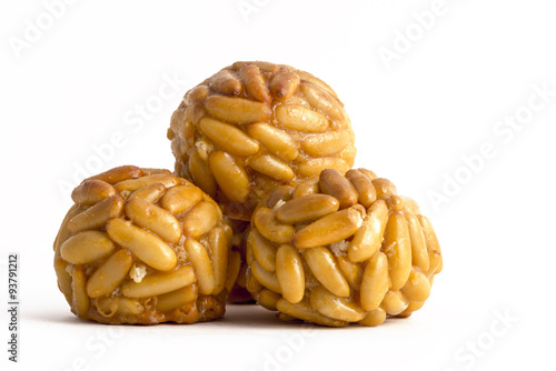 Panellet pine nuts isolated on white photo
