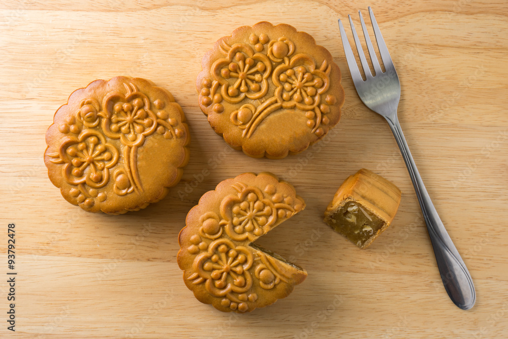 Chinese traditional mooncake , on wooden cutting boards