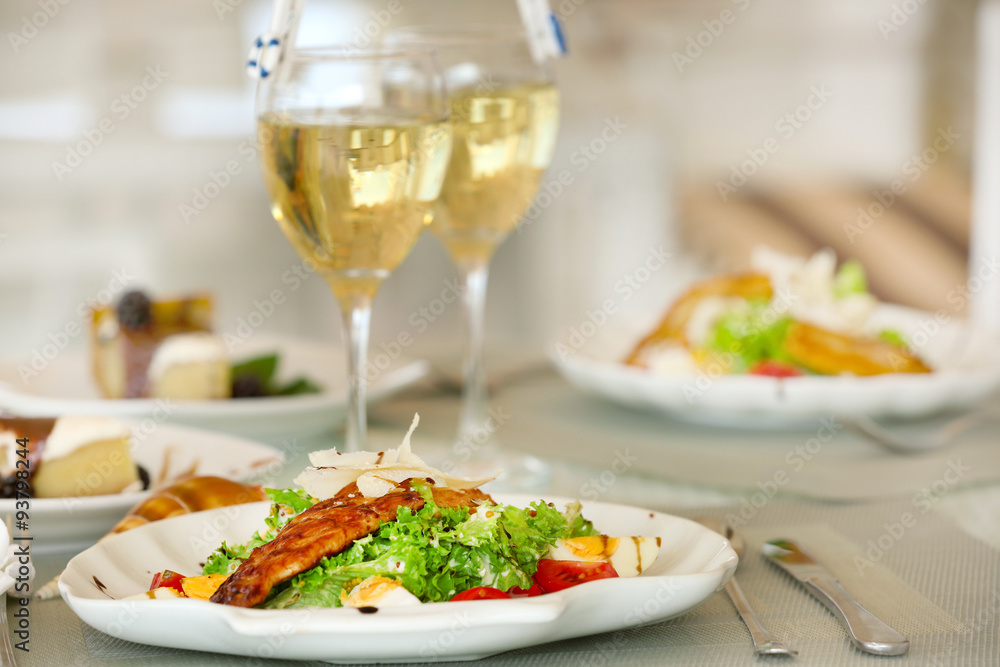 Tasty salad with served wine Tasty salad with served wine