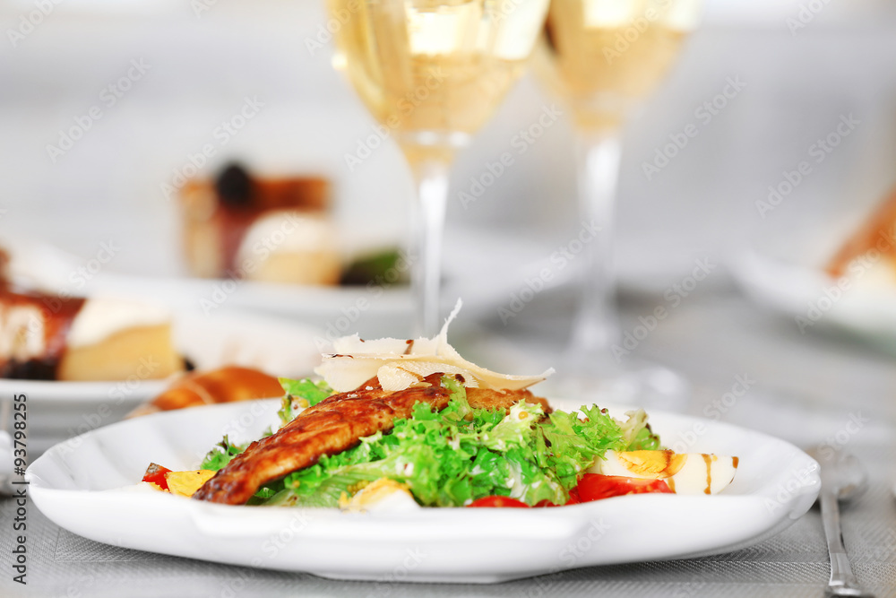 Tasty salad with served wine Tasty salad with served wine