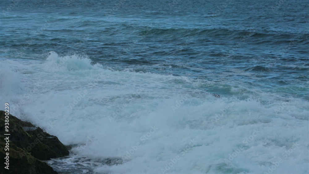 Ocean coast surf waves against rough rocks fast HD 0649 Ocean coast surf waves against rough rocks fast HD 0649