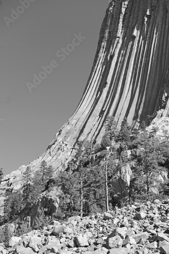 Devils Tower National Monument  a geological landform rising from the grasslands of Wyoming  is a popular tourist attraction  source for Native American legend and rock climbing goal for climbers