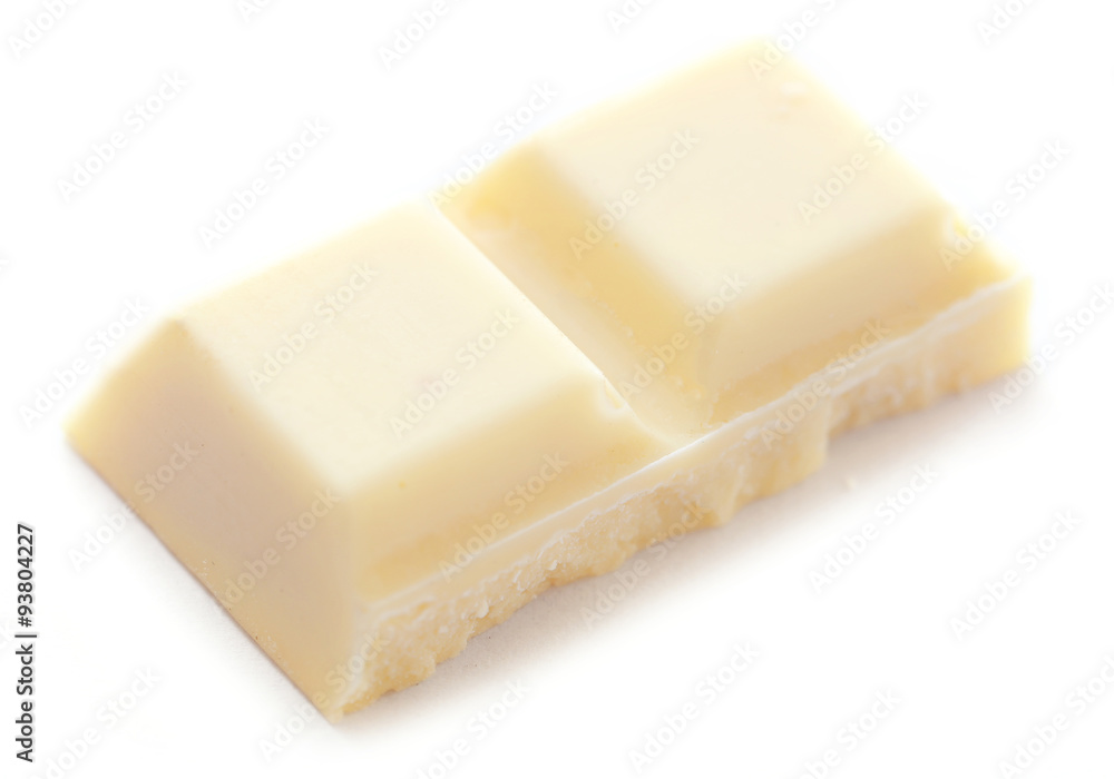 White chocolate pieces isolated on white background