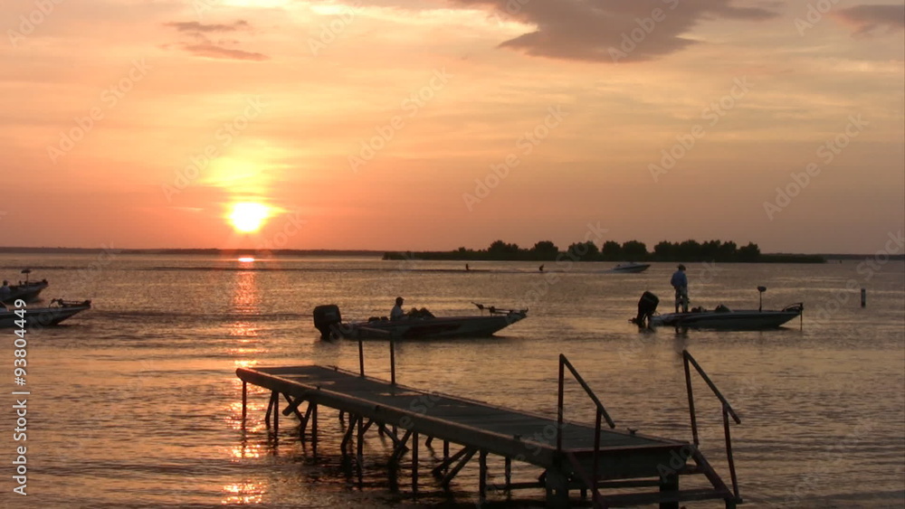 sunset fishing boats around pier water ski Texas HD sunset fishing boats around pier water ski Texas HD