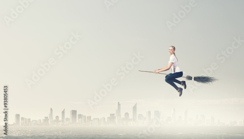 Girl fly on broom