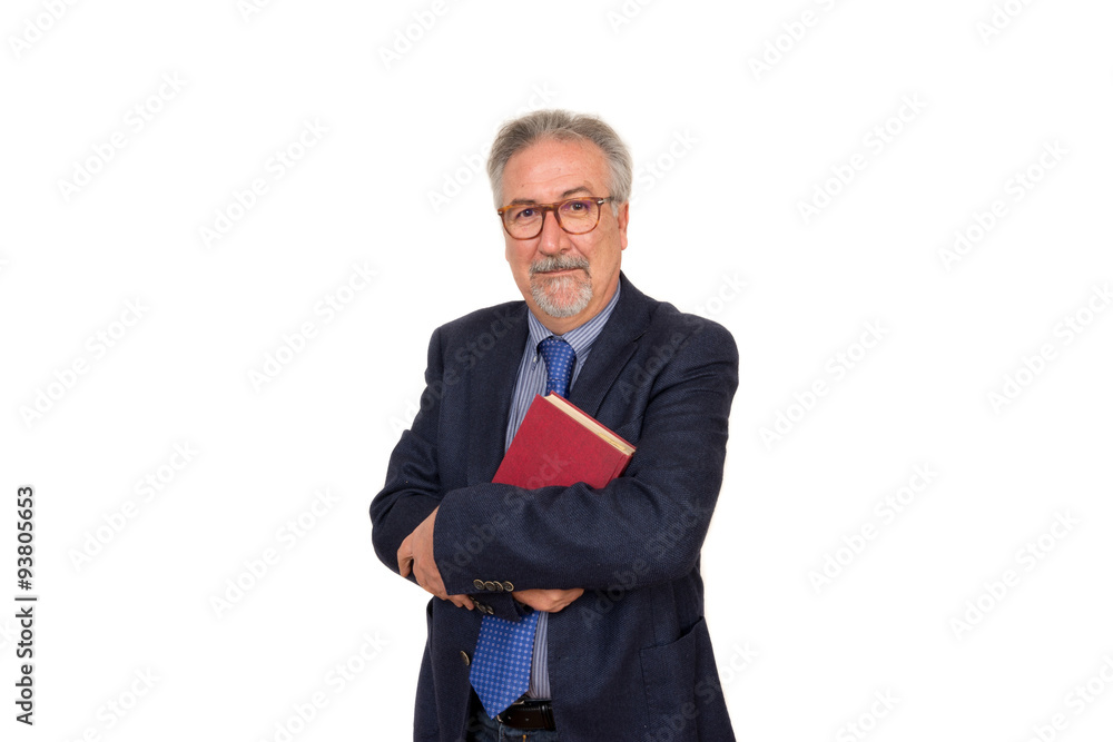 Senior teacher standing holding a book, looking happy, isolated Senior teacher standing holding a book, looking happy, isolated