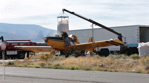 Agriculture aircraft filling seeds for wildfire burn area HD 3458 photo