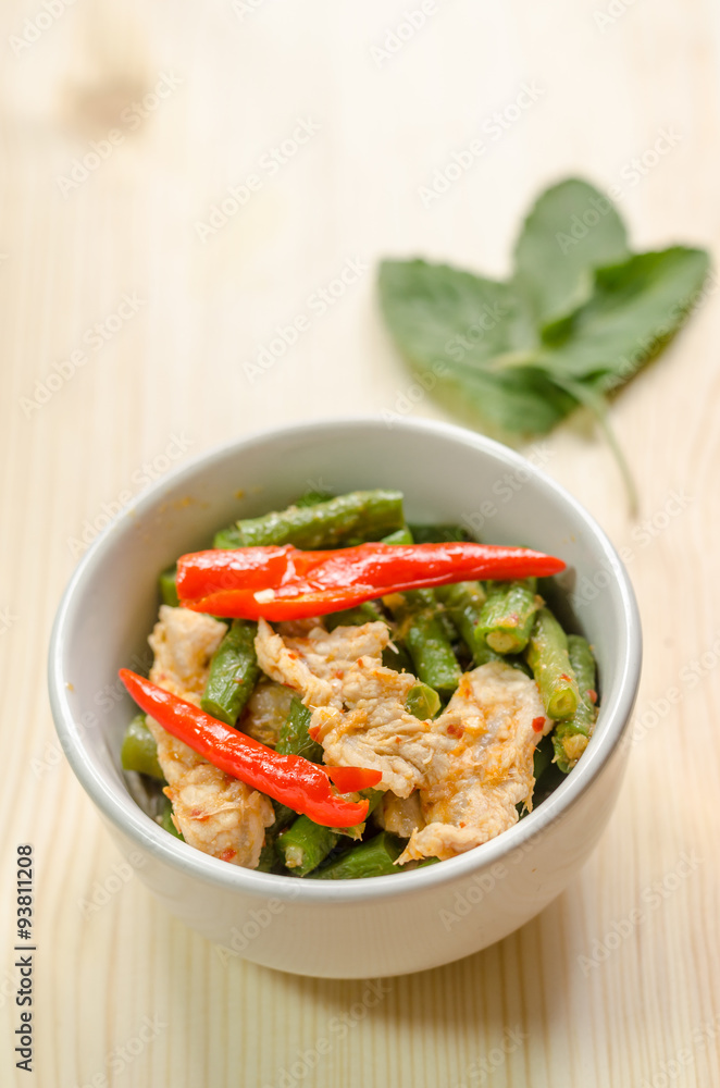 Spicy stir fried pork with red curry paste and Yard Long bean, T Spicy stir fried pork with red curry paste and Yard Long bean, T