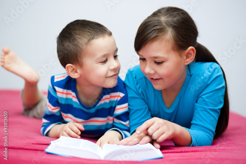 Children is reading book