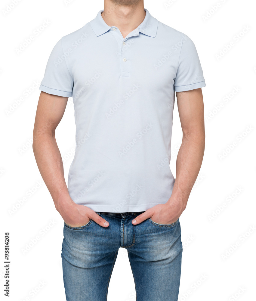 Man wearing light blue polo shirt and denims. Hands are in the pockets. isolated on white background. Man wearing light blue polo shirt and denims. Hands are in the pockets. isolated on white background.