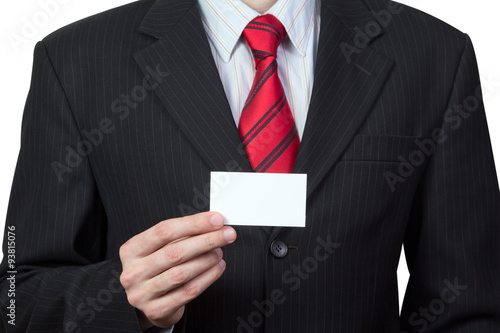Unrecognizable businessman holding a card in hand