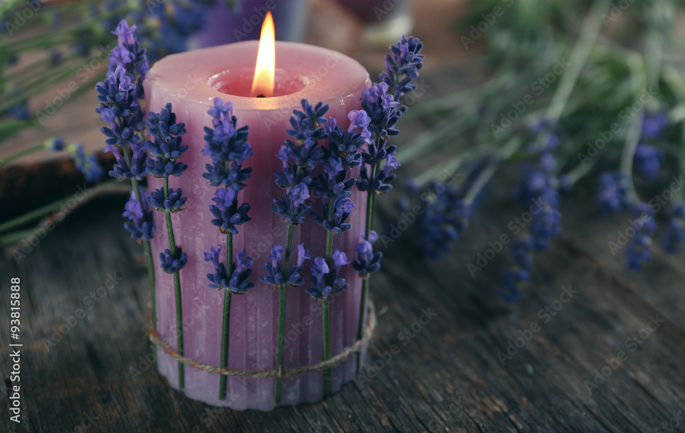 Candles with lavender flowers on table close up - obrazy, fototapety, plakaty 