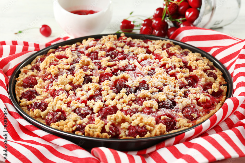 Tasty homemade pie with cherries on table close up Tasty homemade pie with cherries on table close up