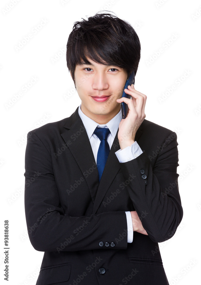 Asian businessman talk to cellphone Asian businessman talk to cellphone