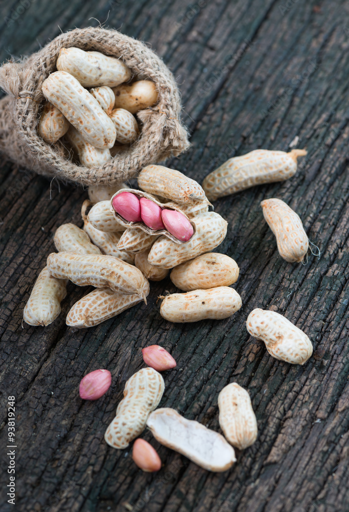 seed peanut on wooden background seed peanut on wooden background