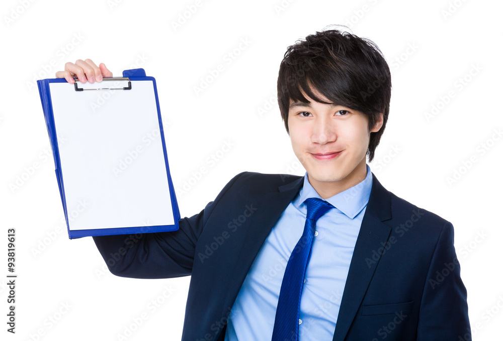 Asian Businessman showing blank page of clipboard Asian Businessman showing blank page of clipboard