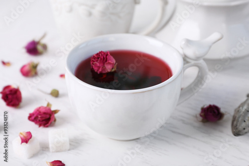 Tea set and rose tea on table