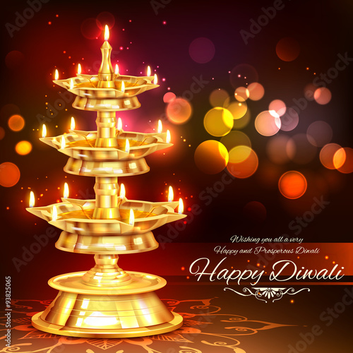 Golden diya stand on abstract Diwali background