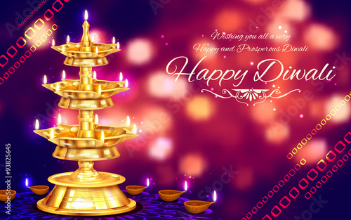 Golden diya stand on abstract Diwali background