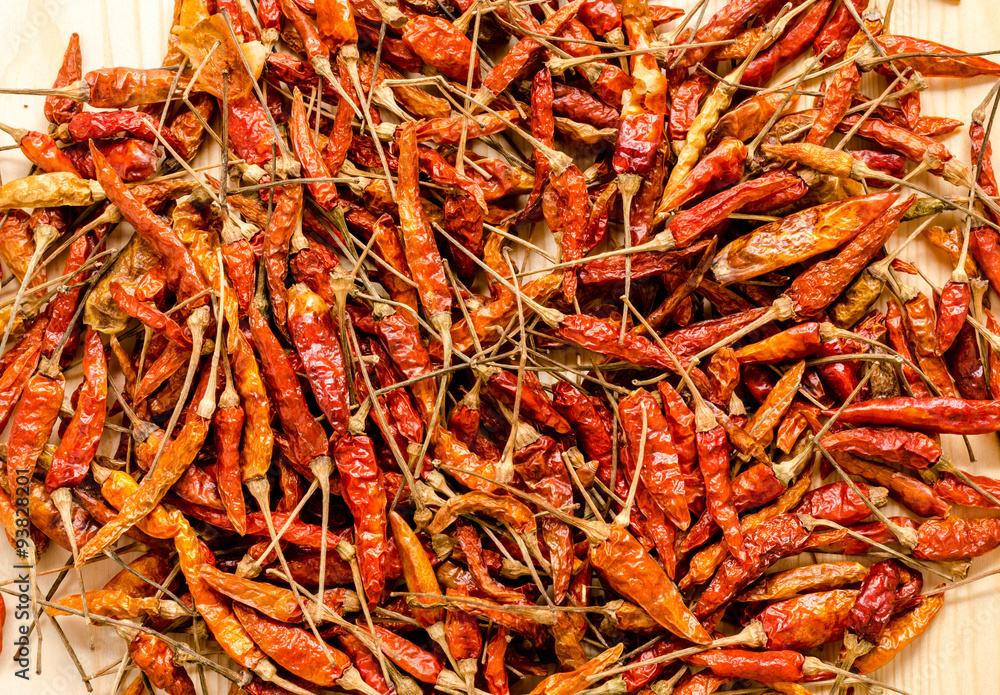 Dried chili peppers background. Thai food seasoning. Close up a Dried chili peppers background. Thai food seasoning. Close up a