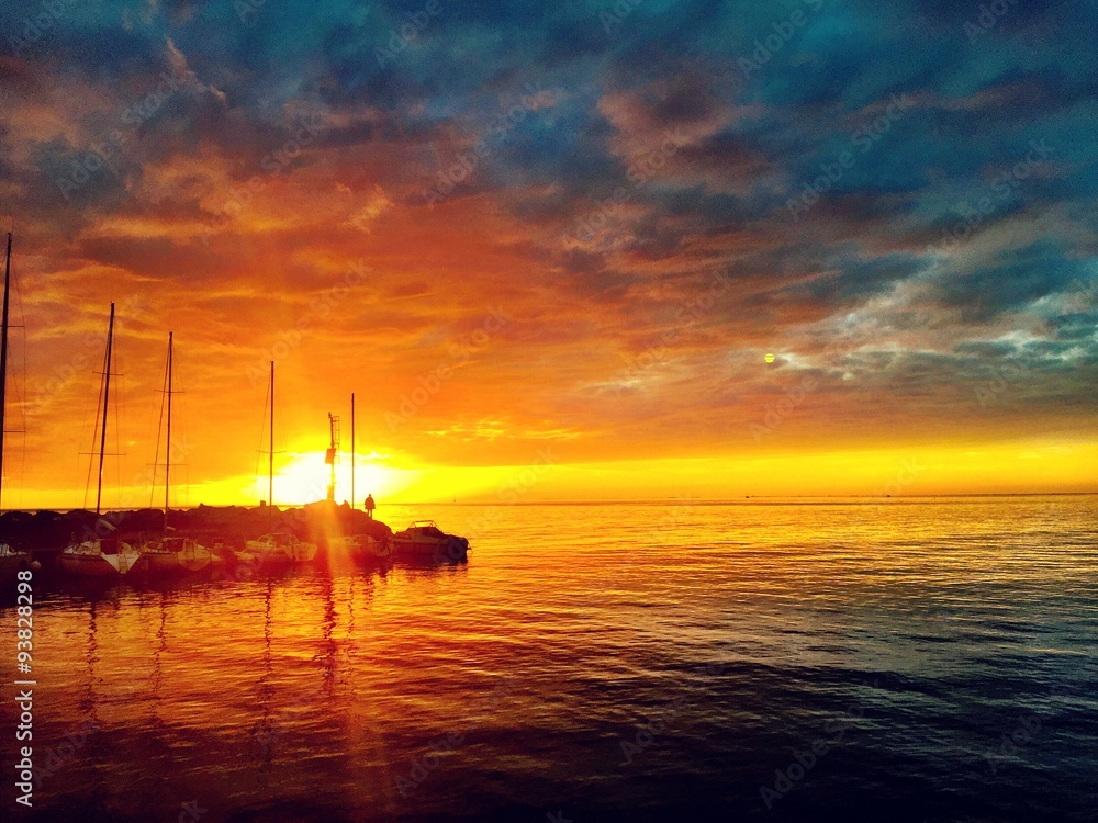 Breathtaking sunset at the Harbor in Trieste Italy Breathtaking sunset at the Harbor in Trieste Italy