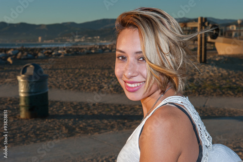 Mexican female teen close view at marina. photo