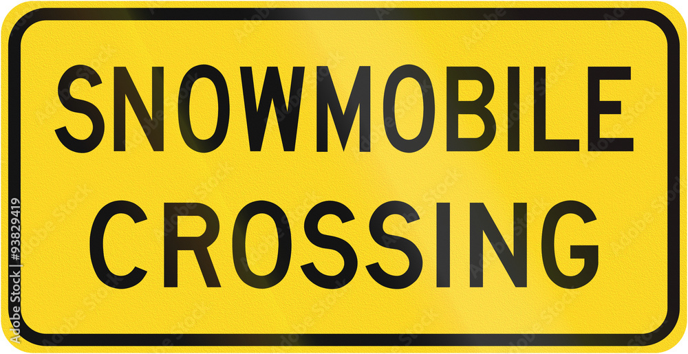 Warning road sign in Canada - Snowmobile crossing. This sign is used in Ontario Warning road sign in Canada - Snowmobile crossing. This sign is used in Ontario
