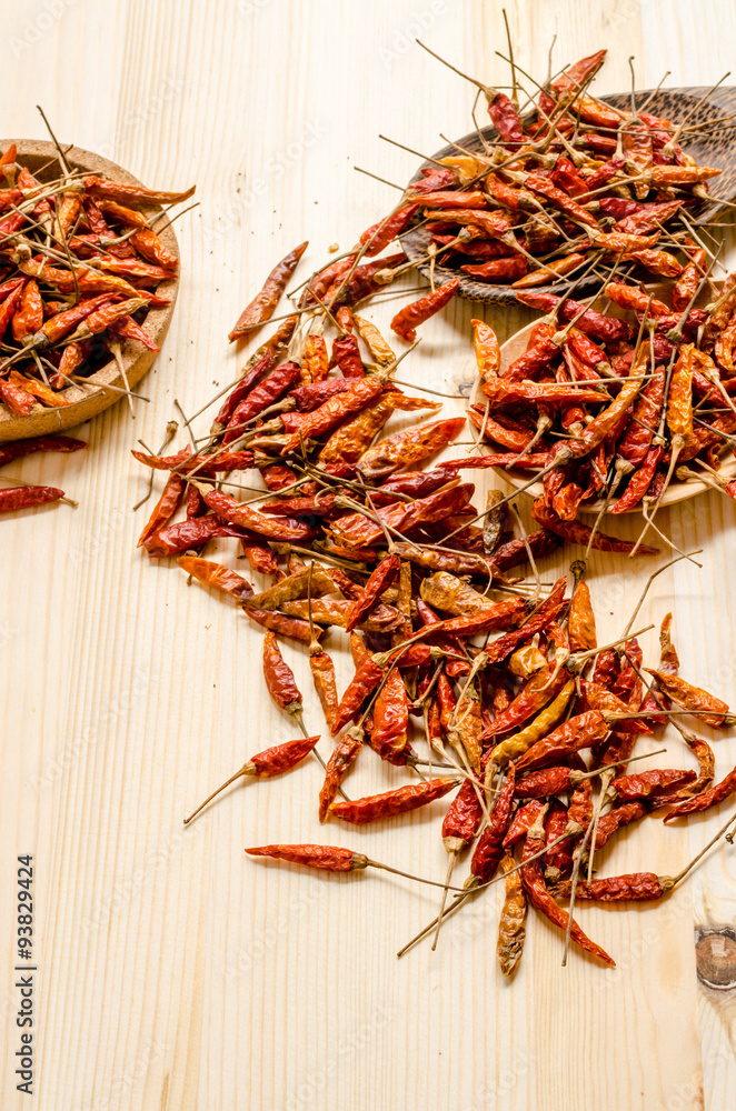 Fototapeta premium Dried chili peppers background. Thai food seasoning.