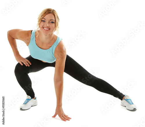 Athletic woman doing sport exercises. isolated on white background