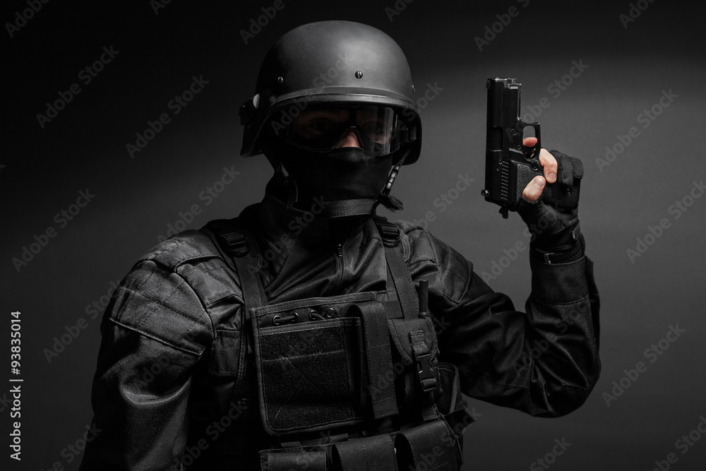SWAT police officer with pistol 