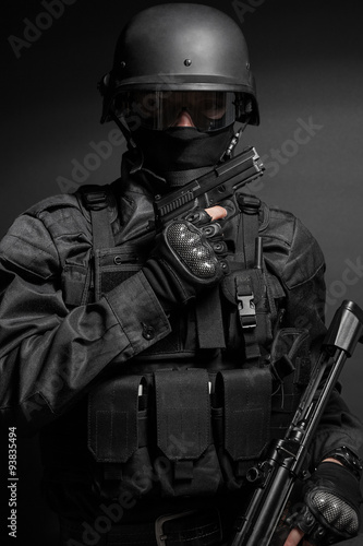 SWAT police officer with pistol 