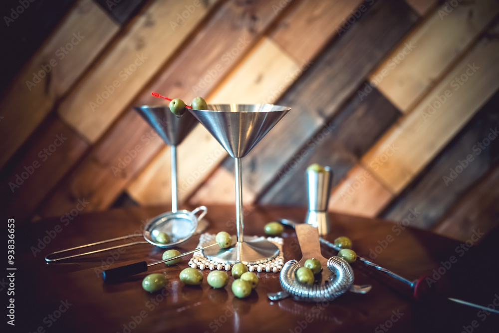 Classic martini with olives served cold in restaurant or pub. Alcoholic cocktails in local bar.