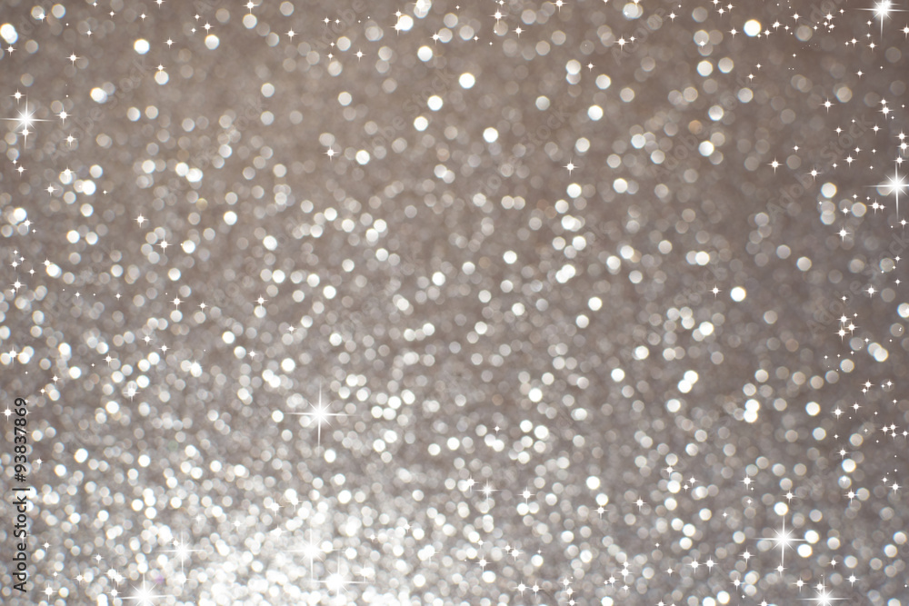 Silver white glittering Christmas lights. Blurred abstract backg Silver white glittering Christmas lights. Blurred abstract backg