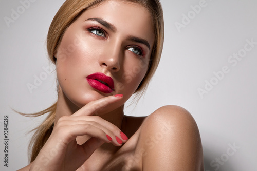 Beautiful blonde woman with red lips