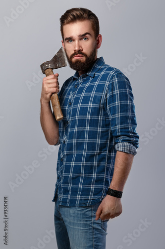 Handsome bearded man in checkered shirt