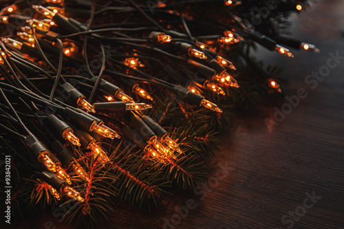 Christmas lights and branches of spruce