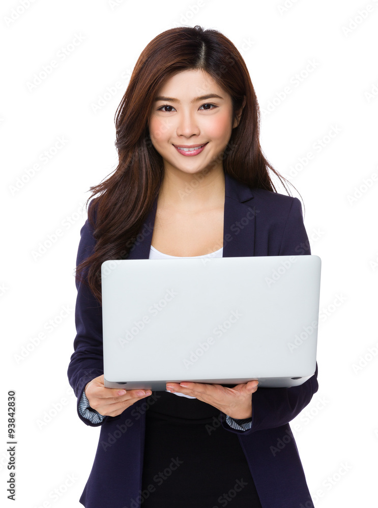 Young Asian businesswoman use of the laptop computer Young Asian businesswoman use of the laptop computer
