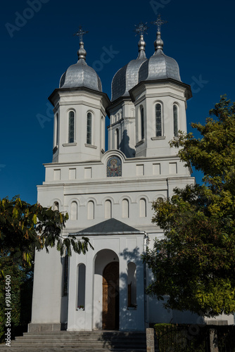Front view of a romanian church on a blue sky